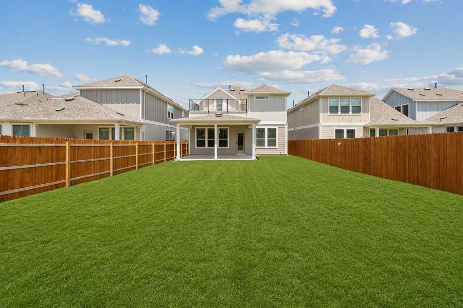 Exterior details and patio area of a home in Santa Rita Ranch, Liberty Hill (Image 17).