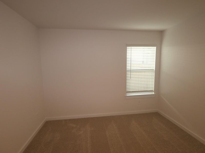 Spacious, unfurnished interior of a new home in Pinewood at Grand Texas, New Caney (Image 31).