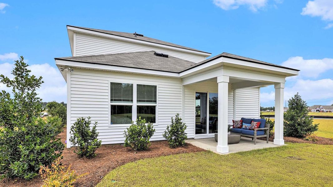 Exterior details and patio area of a home in Dove Crossing, Conway (Image 3).
