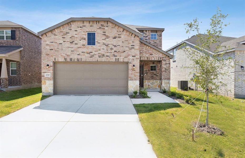 NEW CONSTRUCTION: Beautiful two-story home available at Arbordale in Forney