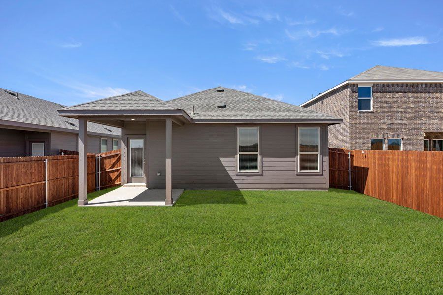 Representative exterior photo of a completed home built from the Birch by Impression Homes in Creekside Ranch, Blue Ridge, TX (Image 25).
