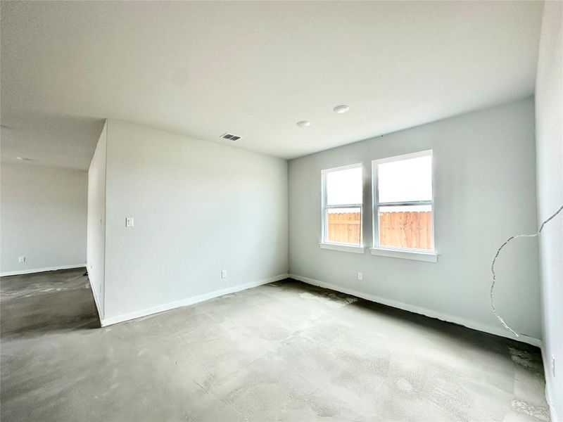 Unfurnished room featuring baseboards