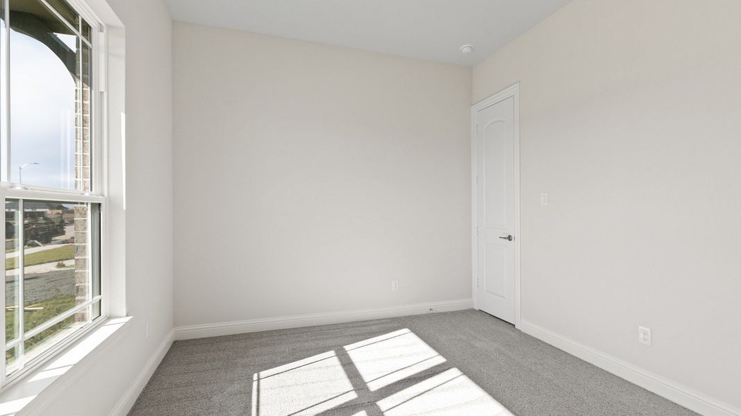 Representative furnished interior of a home built from the Yale by DRB Homes in Brookewater, Rosenberg (Image 14).