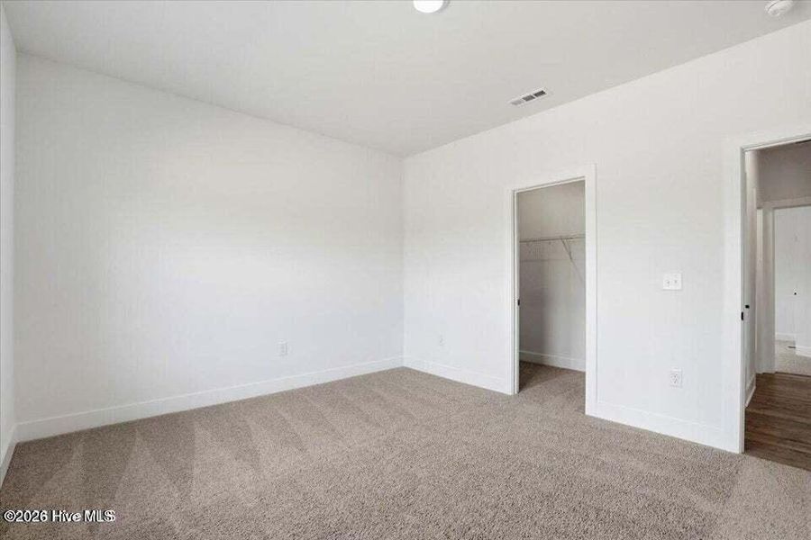 Spacious, unfurnished interior of a new home in Wood Creek Landing, Leland (Image 21). Spacious, unfurnished interior of a new home in Wood Creek Landing, Leland (Image 21).
