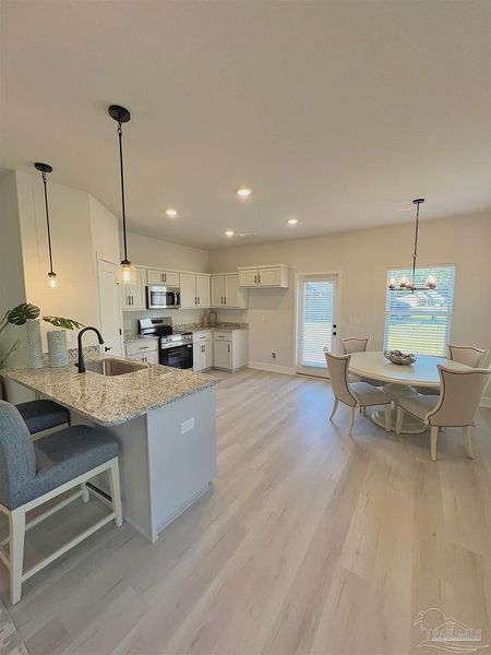Furnished interior view inside a new home in Allison Acres, Cantonment (Image 6).