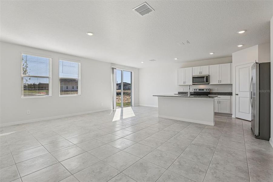 Spacious, unfurnished interior of a new home in Crosswinds - Signature Series, Haines City (Image 32).