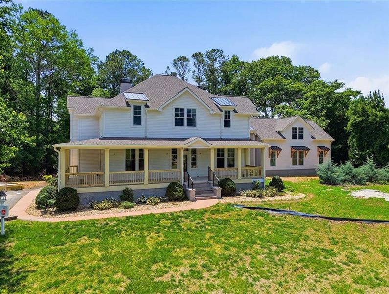 Front exterior of a new home in , Marietta, GA, highlighting curb appeal (Image 13).