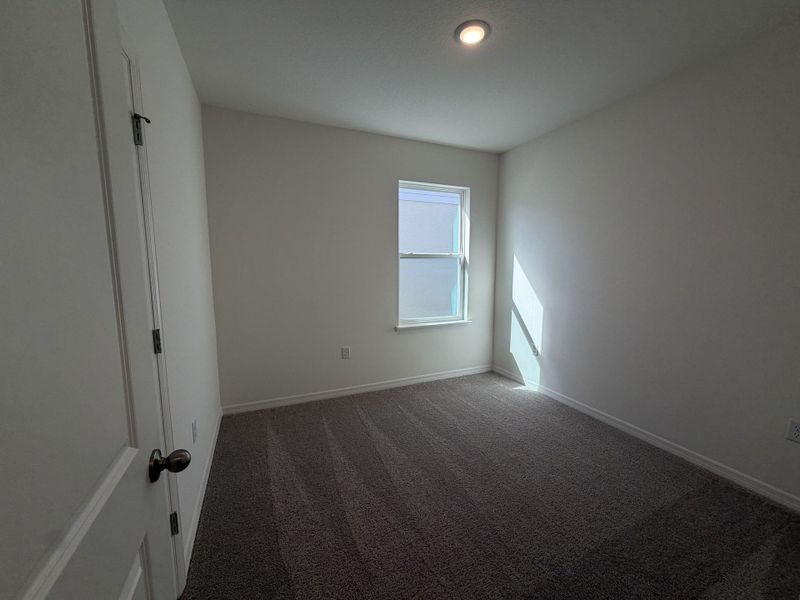 Spacious, unfurnished interior of a new home in Hammock Reserve, Haines City (Image 8).