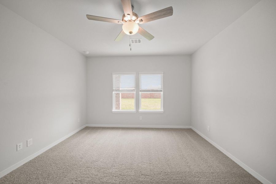 Spacious, unfurnished interior of a new home in Sunterra, Katy (Image 22).