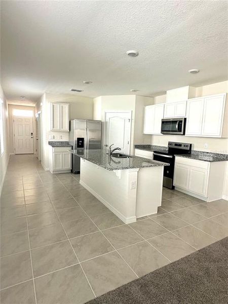 Furnished interior view inside a new home in , Kissimmee (Image 8).