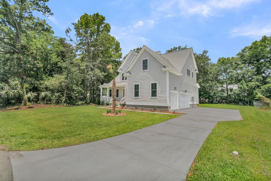 Front exterior of a new home in , Mount Pleasant, SC, highlighting curb appeal (Image 2). Front exterior of a new home in , Mount Pleasant, SC, highlighting curb appeal (Image 2).