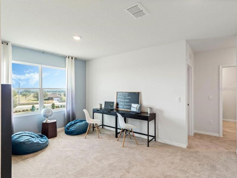 Furnished interior view inside a new home in Cascades, Davenport (Image 21). Furnished interior view inside a new home in Cascades, Davenport (Image 21).