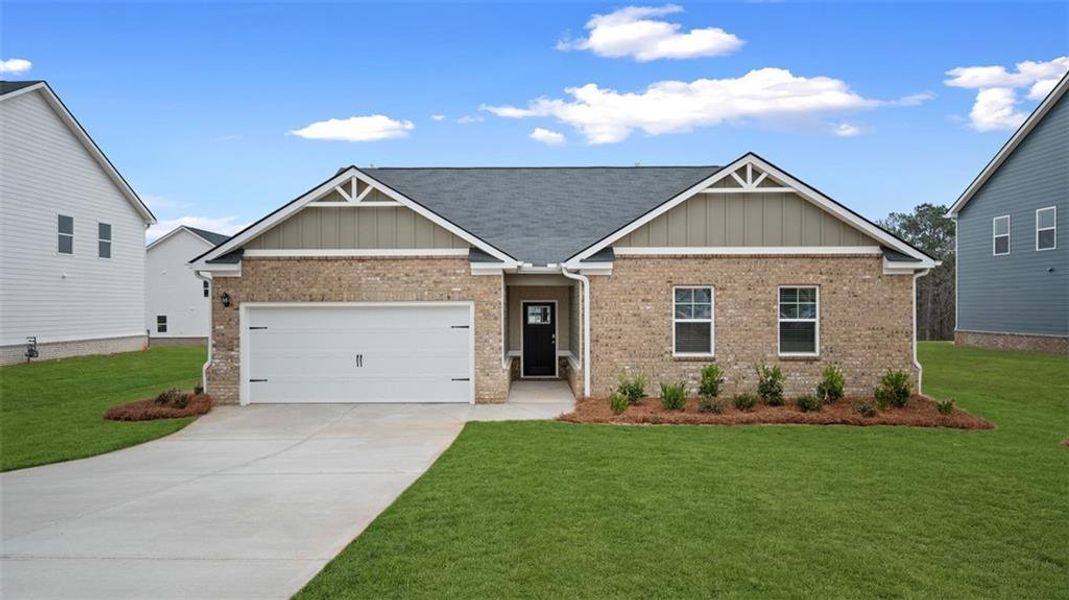 Front exterior of a new home in Bridle Creek, Locust Grove, GA, highlighting curb appeal (Image 2).