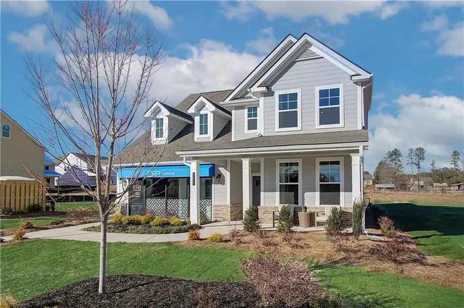 Front exterior of a new home in Cooper Park, McDonough, GA, highlighting curb appeal (Image 2). Front exterior of a new home in Cooper Park, McDonough, GA, highlighting curb appeal (Image 2).