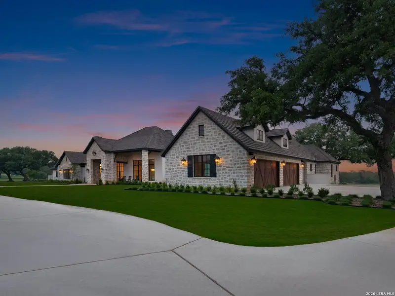 Front exterior of a new home in , Boerne, TX, highlighting curb appeal (Image 26).
