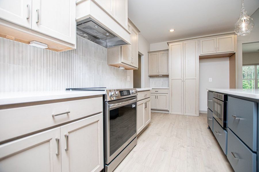Furnished interior view inside a new home in WOODMONT RESERVE, Roopville (Image 9).