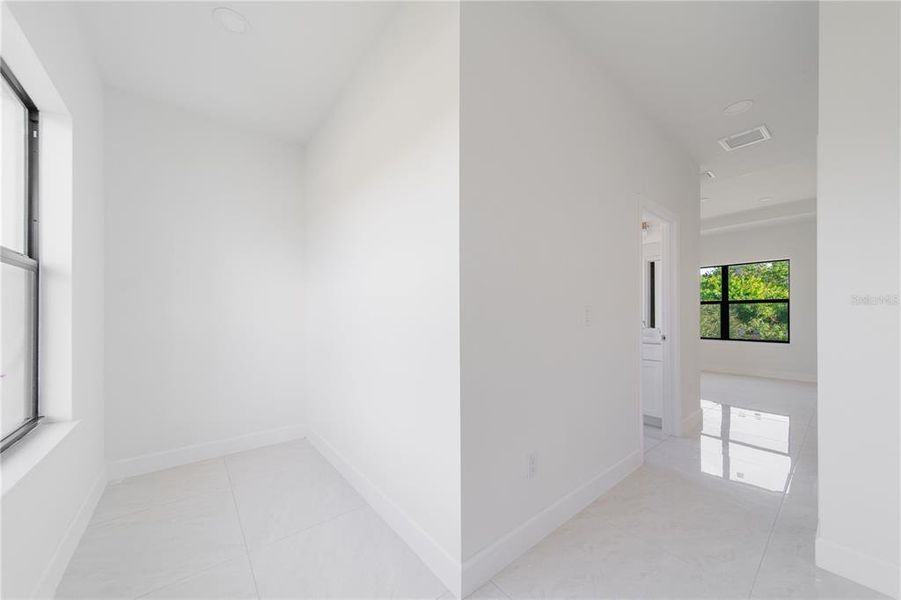 Spacious, unfurnished interior of a new home in , Port Charlotte (Image 15). Spacious, unfurnished interior of a new home in , Port Charlotte (Image 15).
