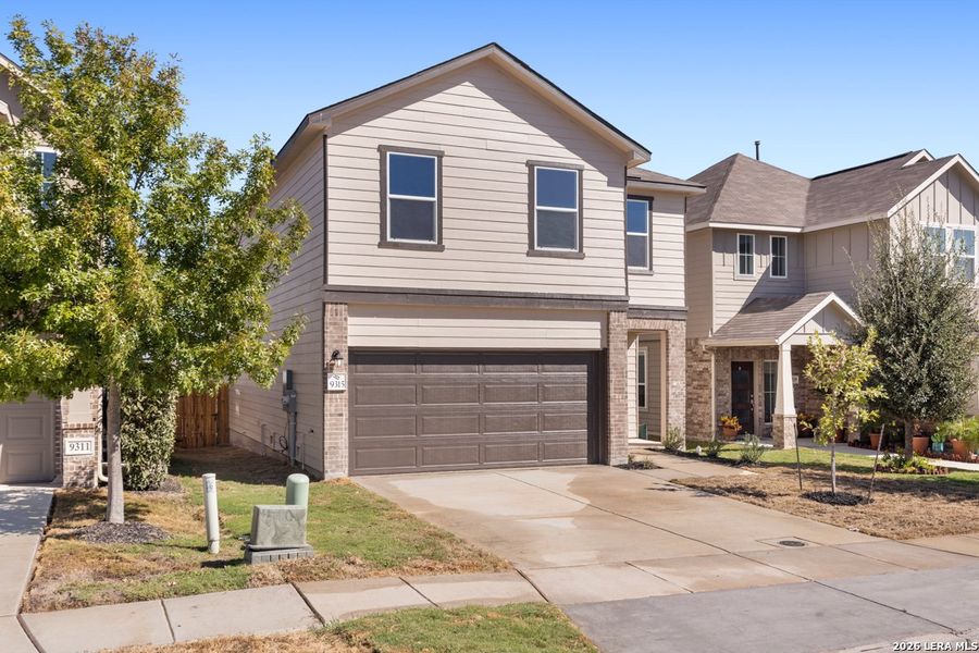 Front exterior of a new home in Knox Ridge, Converse, TX, highlighting curb appeal (Image 21).