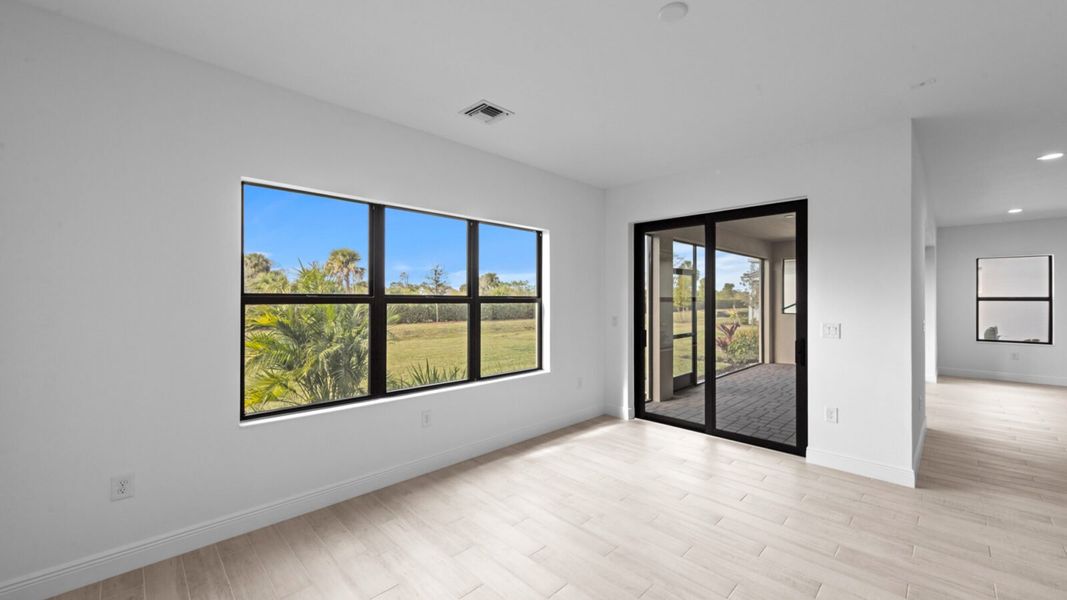 Spacious, unfurnished interior of a new home in SkySail, Naples (Image 30).