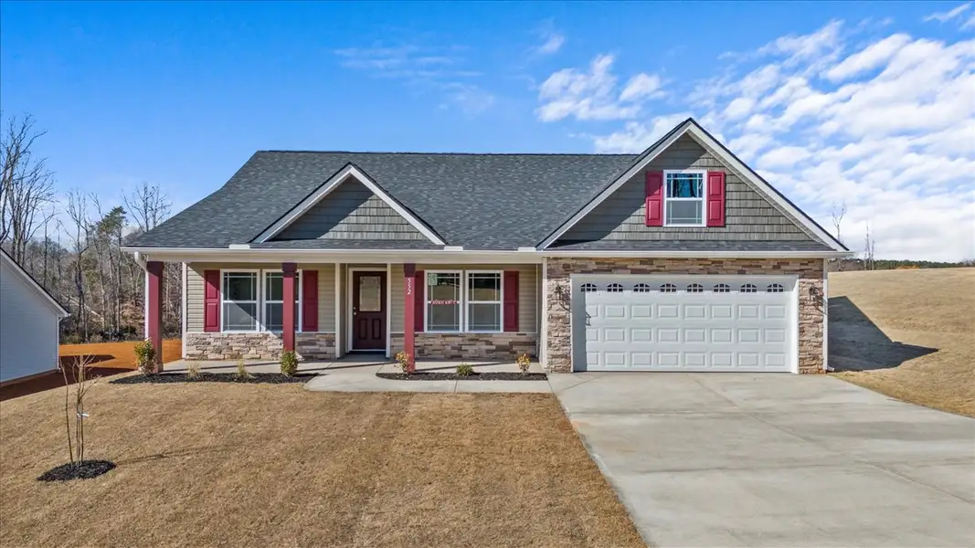 Representative exterior photo of a completed home built from the Brentwood by Enchanted Homes in Mills Gin, Campobello, SC (Image 1).
