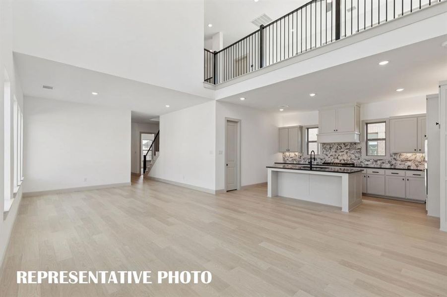 Our Marcel plan offers a home designed for entertaining with the game room open to the family room createing a dual level entertainment zone. REPRESENTATIVE PHOTO Our Marcel plan offers a home designed for entertaining with the game room open to the family room createing a dual level entertainment zone. REPRESENTATIVE PHOTO