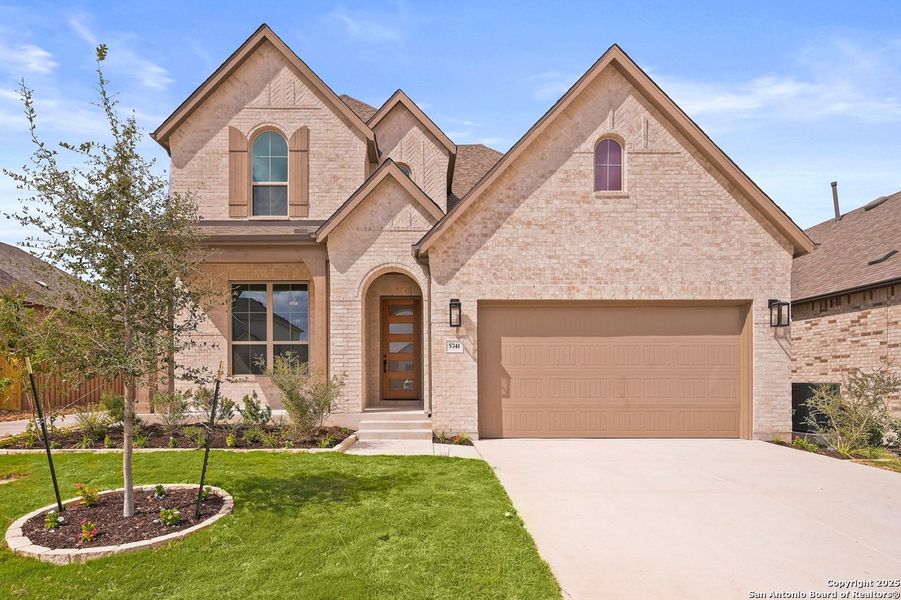 Front exterior of a new home in , New Braunfels, TX, highlighting curb appeal (Image 1). Front exterior of a new home in , New Braunfels, TX, highlighting curb appeal (Image 1).