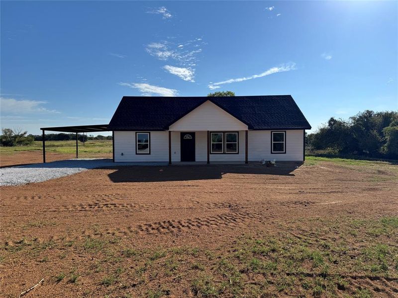 Exterior details and patio area of a home in , Springtown (Image 1).