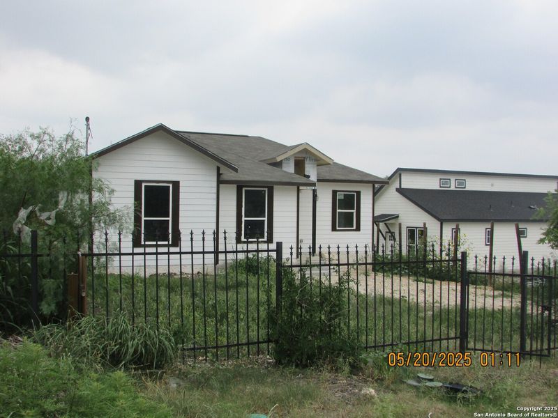 Front exterior of a new home in , San Antonio, TX, highlighting curb appeal (Image 16).
