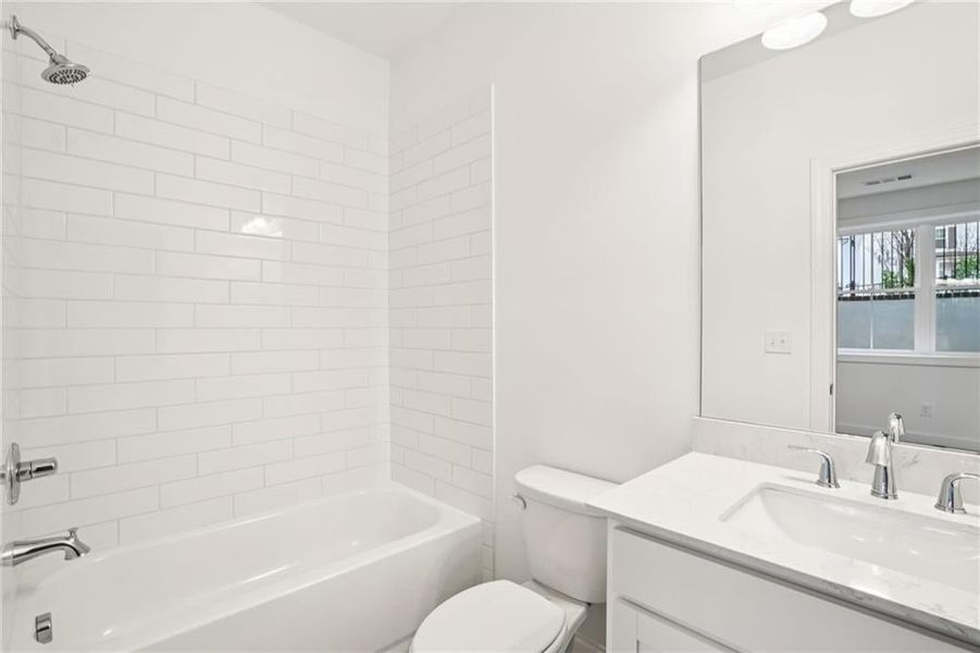 Basement Bathroom Pictures of not of actual home but same floorplan with similar options in same community* Townhome is complete