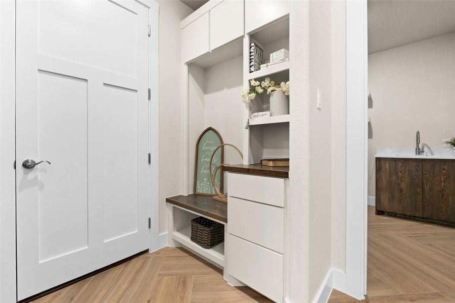 Mudroom with a sink