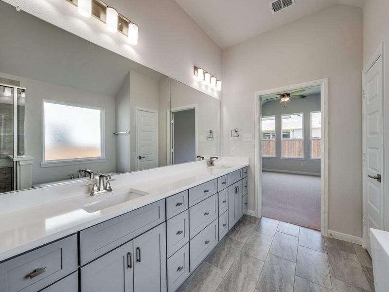 No shortage of space or style in this gorgeous owner's bath!