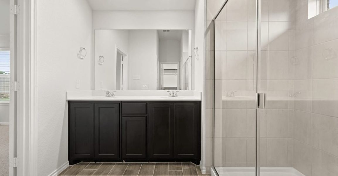 Representative exterior photo of a completed home built from the Pembridge II by Impression Homes in Mountain Valley, Burleson, TX (Image 16). Representative exterior photo of a completed home built from the Pembridge II by Impression Homes in Mountain Valley, Burleson, TX (Image 16).