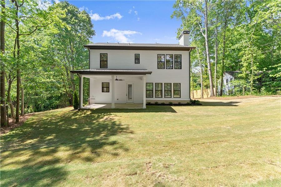 Exterior details and patio area of a home in , Flowery Branch (Image 26).