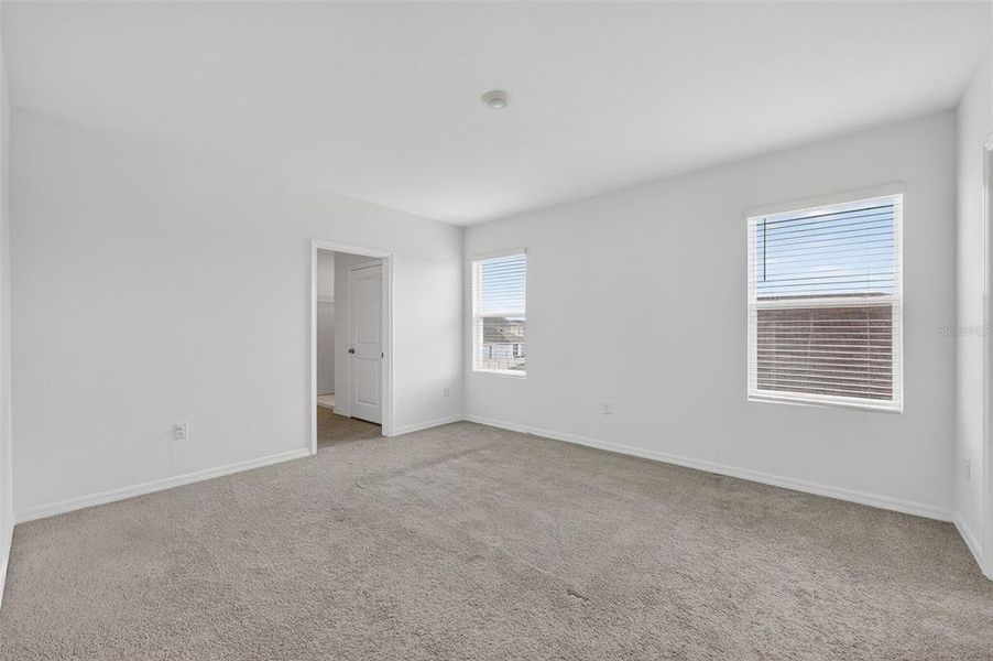 Spacious, unfurnished interior of a new home in Farm at Varrea, Plant City (Image 14).