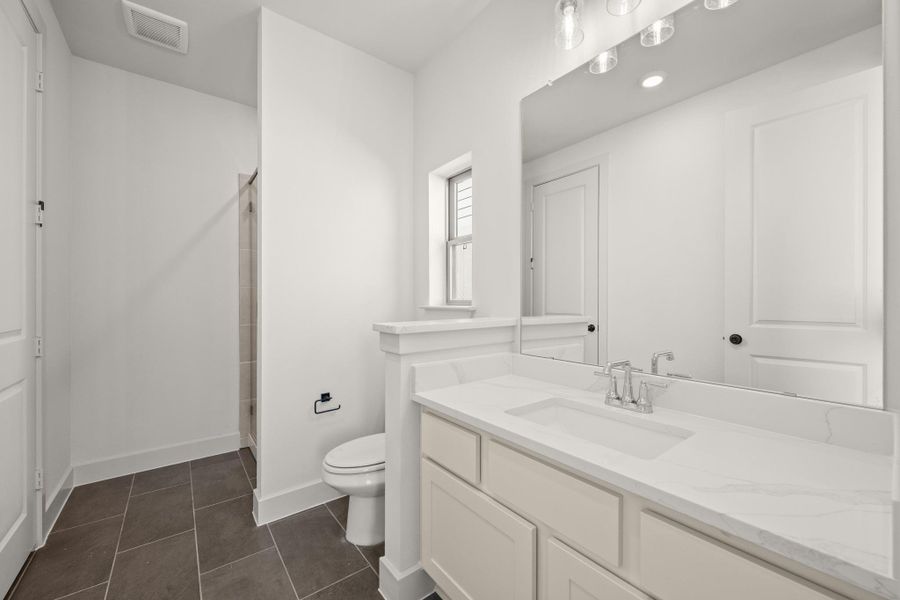 Furnished interior view inside a new home in Provence, Austin (Image 16).