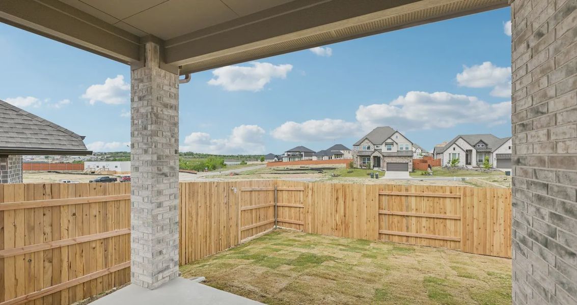 Exterior details and patio area of a home in Sunfield, Buda (Image 3). Exterior details and patio area of a home in Sunfield, Buda (Image 3).