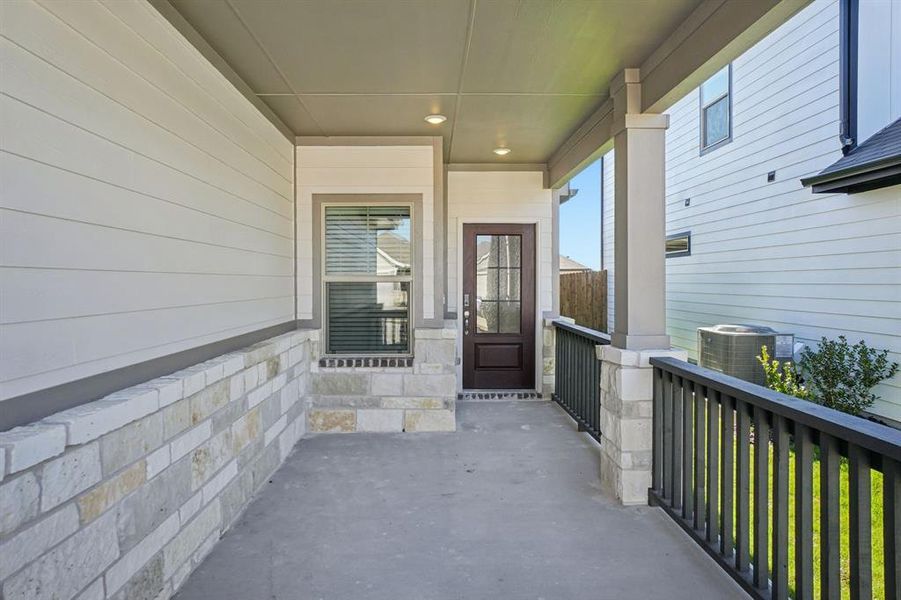 Exterior details and patio area of a home in Trails of Lavon - Signature Series, Lavon (Image 3).