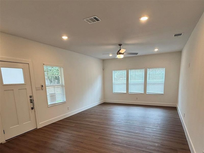 Entrance foyer featuring dark wood-style flooring, recessed lighting, and ceiling fan