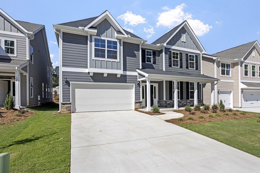 Front exterior of a new home in Georgias Landing, Raleigh, NC, highlighting curb appeal (Image 2).