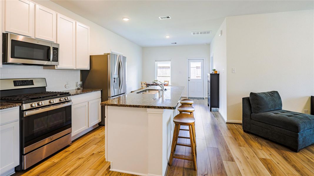 Furnished interior view inside a new home in Woodshore, Clute (Image 6).