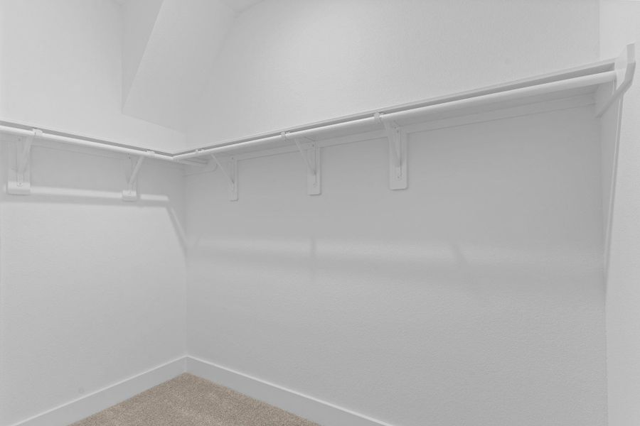 The large walk-in closet offers generous hanging space and open shelving, giving you all the room you need to stay organized and clutter-free.  This is only half the size of the closet need to come by to see the other half!