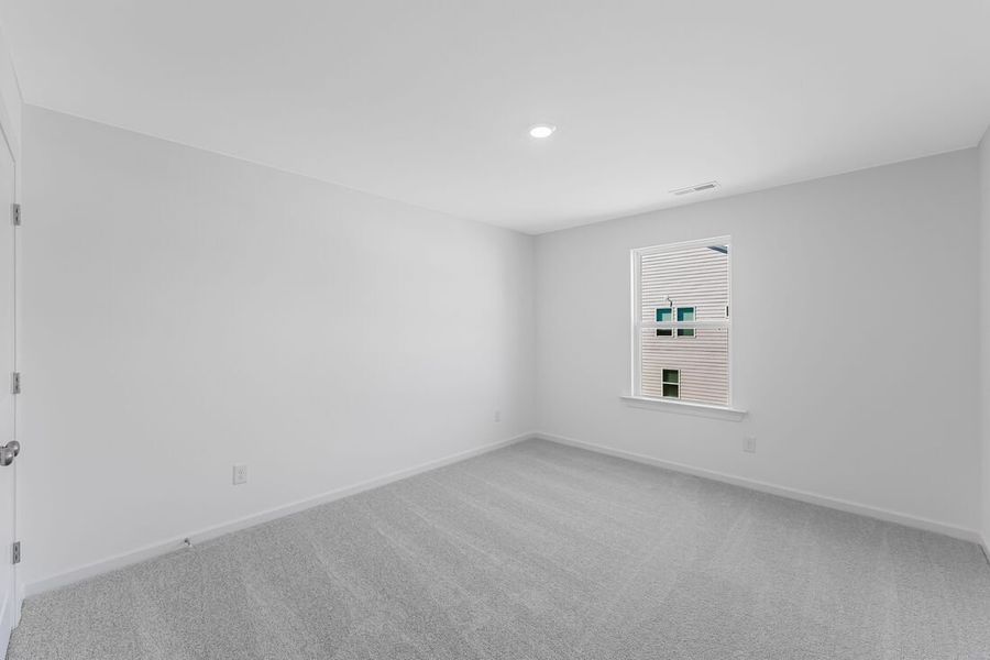 Spacious, unfurnished interior of a new home in Magnolia Townes, Wendell (Image 7).