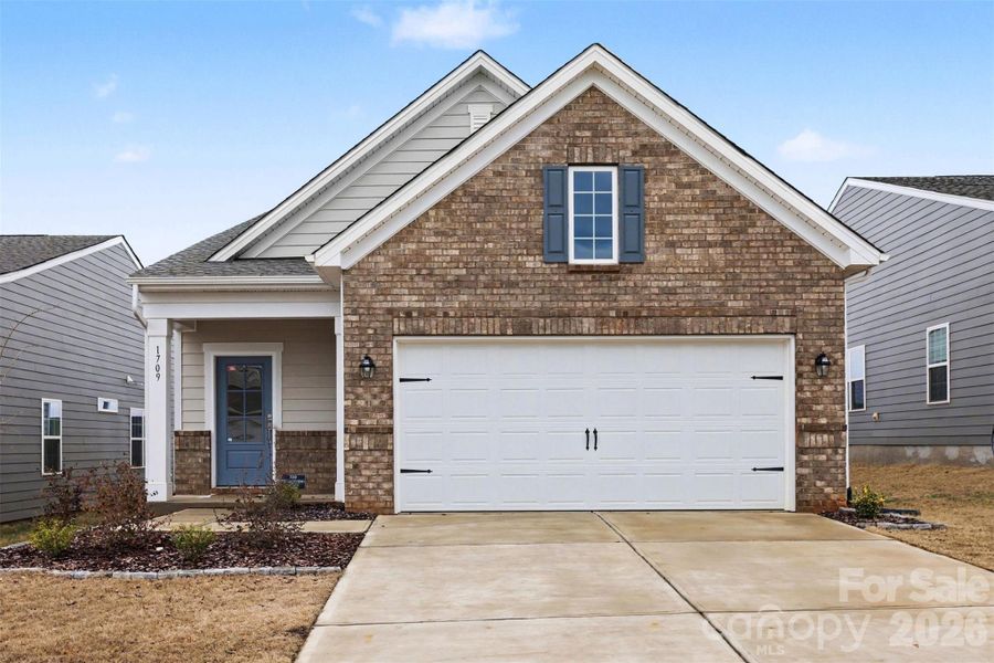 Front exterior of a new home in Elizabeth, Fort Mill, SC, highlighting curb appeal (Image 22). Front exterior of a new home in Elizabeth, Fort Mill, SC, highlighting curb appeal (Image 22).