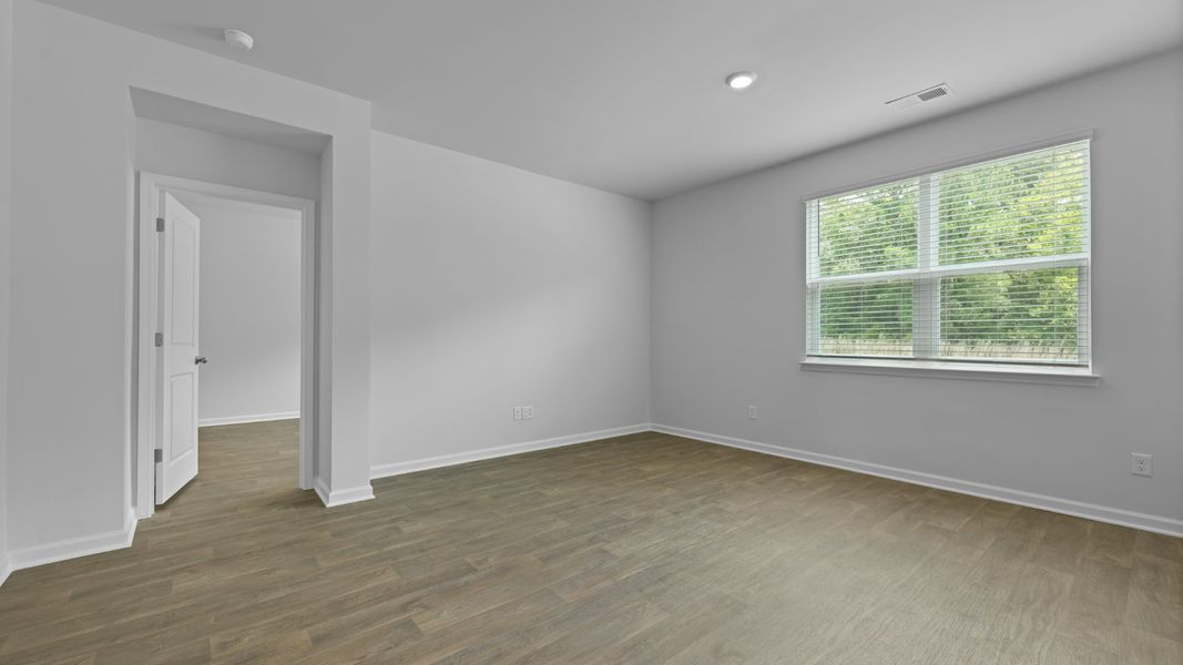 Representative unfurnished interior of a home built from the CALI by D.R. Horton in The Ranch, Holly Hill (Image 20).