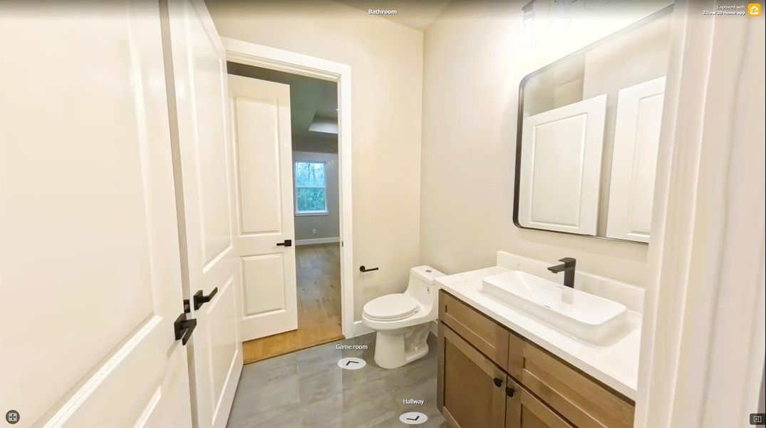 Half Bath between Game room and Mud Area