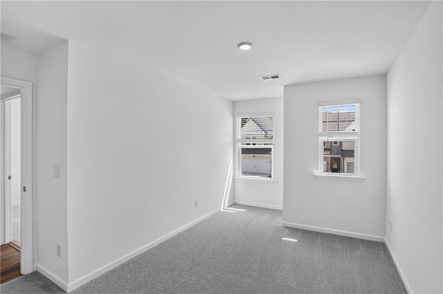 Spacious, unfurnished interior of a new home in Towns at Ivy Creek, Buford (Image 13).