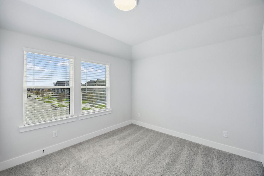 Spacious, unfurnished interior of a new home in Painted Tree Woodland West, McKinney (Image 30).