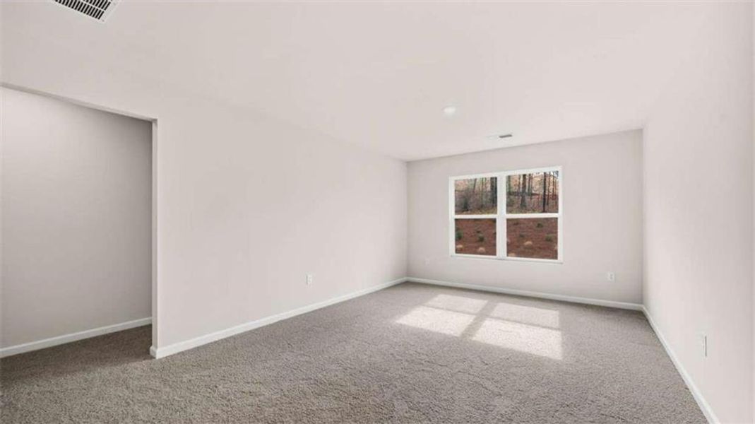 Spacious, unfurnished interior of a new home in Brooks Station, Dacula (Image 32).