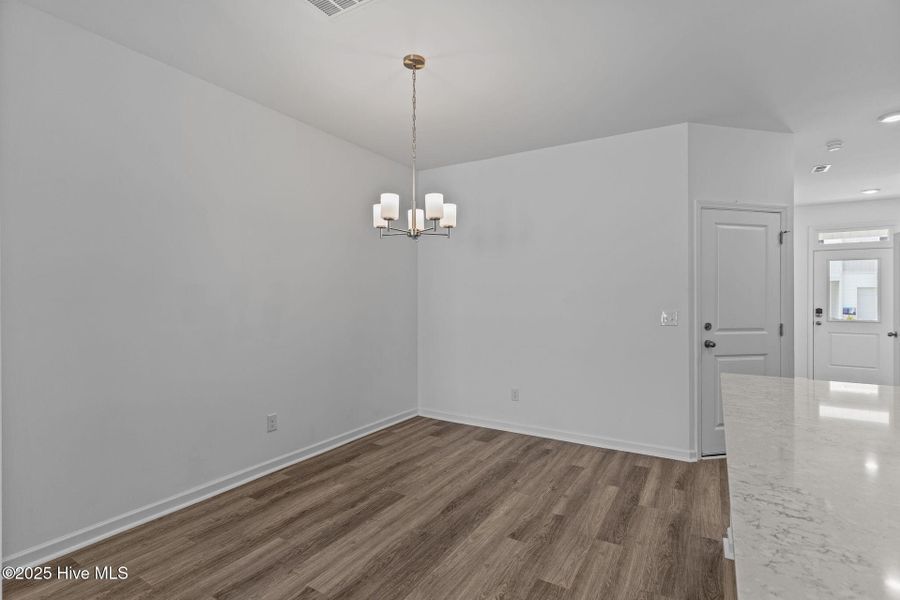 Spacious, unfurnished interior of a new home in Coastal Haven Townes, Leland (Image 18).