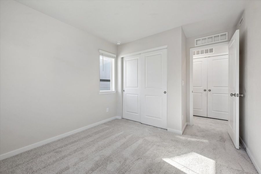 A room with white doors.